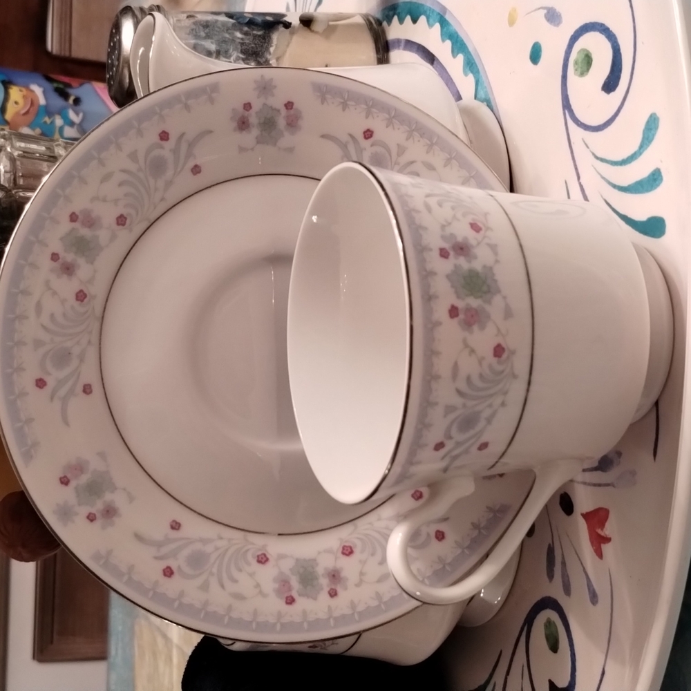 Vintage Serenade fine china footed tea cup and saucer set